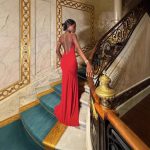Elegant, Form-fitting Long Dress With Thin Spaghetti Straps And A Halter Neckline